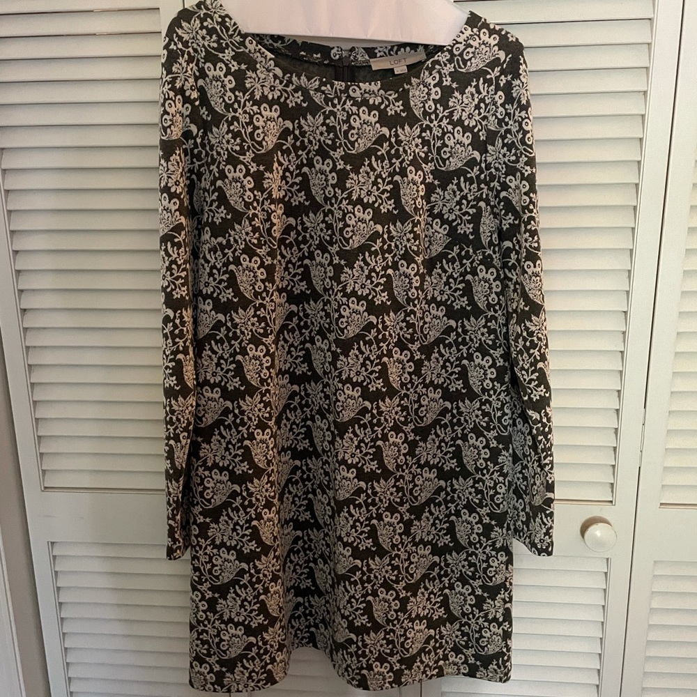 Loft long sleeves, I’m 5’2 and it hits just below the knee. Soft woven cotton.